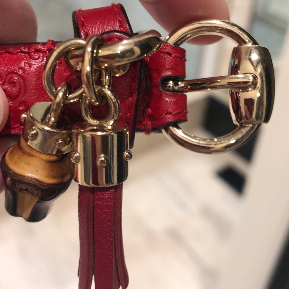 Authentic Gucci embossed leather skinny belt. RED!